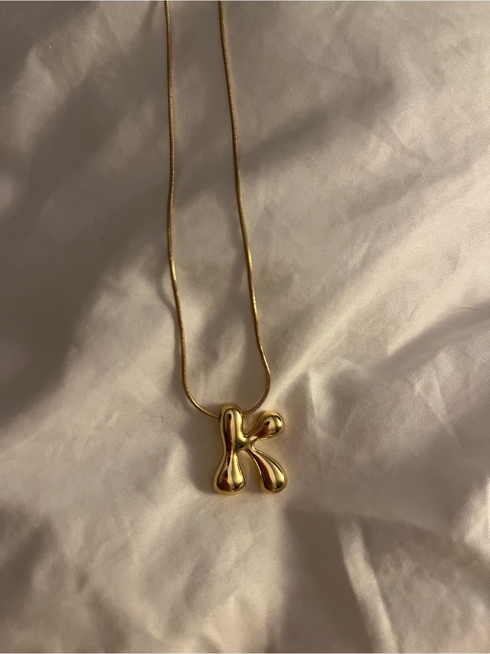 Bubble K necklace